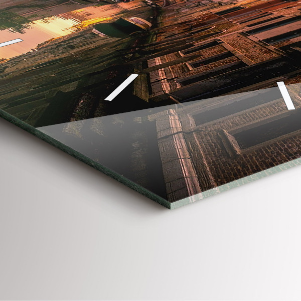 Square glass wall clock View of the canal in the city