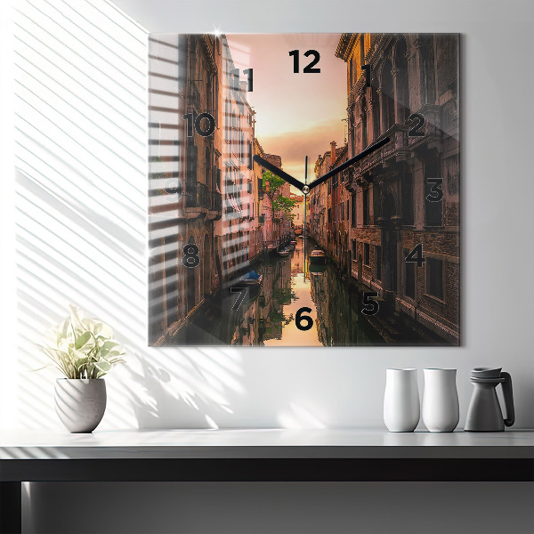 Square glass wall clock View of the canal in the city