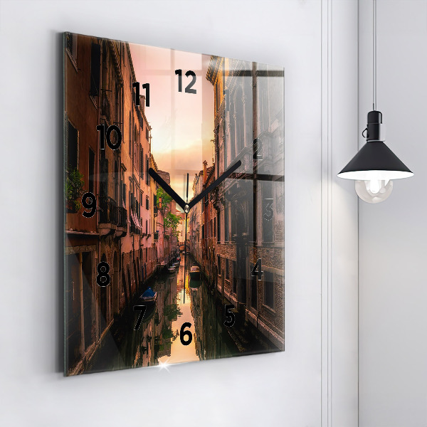 Square glass wall clock View of the canal in the city