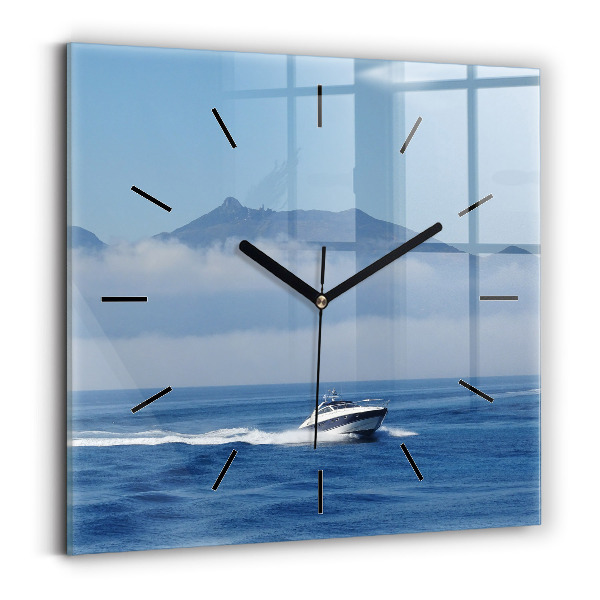 Square glass wall clock A boat floating on the ocean