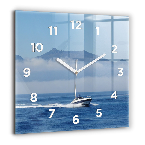 Square glass wall clock A boat floating on the ocean
