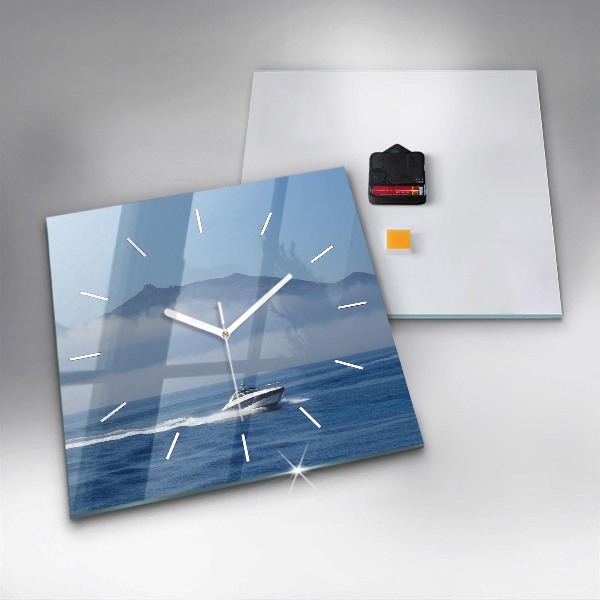 Square glass wall clock A boat floating on the ocean