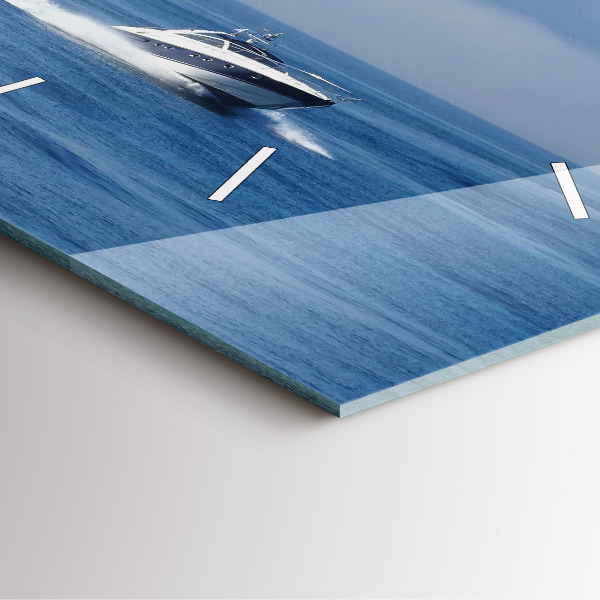 Square glass wall clock A boat floating on the ocean