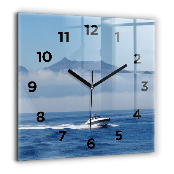 Square glass wall clock A boat floating on the ocean
