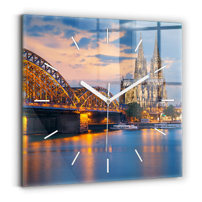 Square glass wall clock View of the town hall