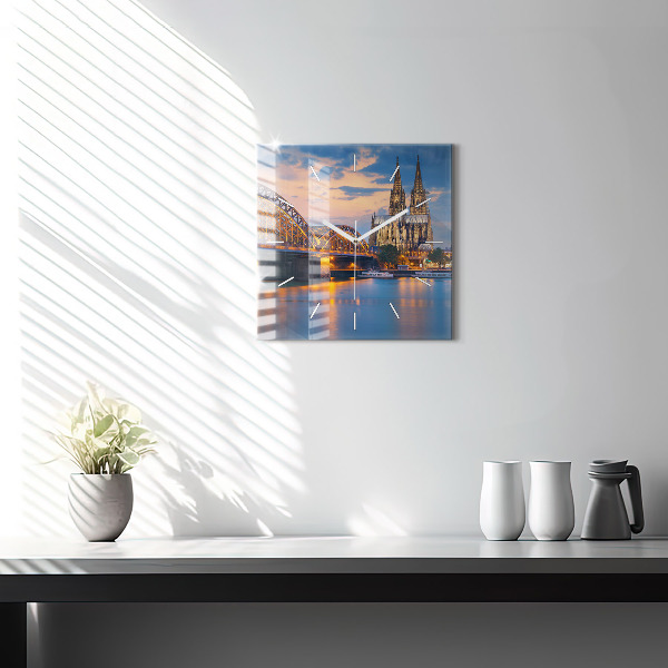 Square glass wall clock View of the town hall