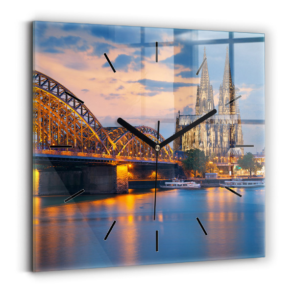 Square glass wall clock View of the town hall