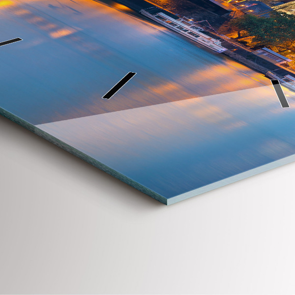 Square glass wall clock View of the town hall