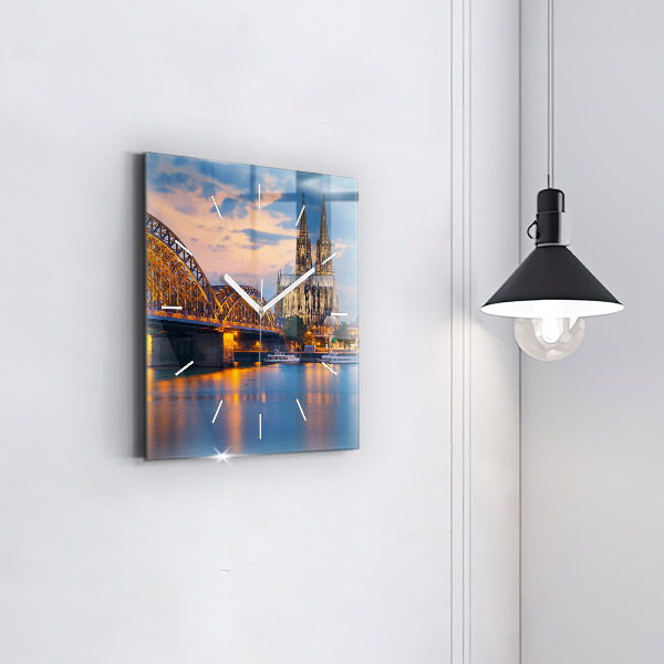 Square glass wall clock View of the town hall