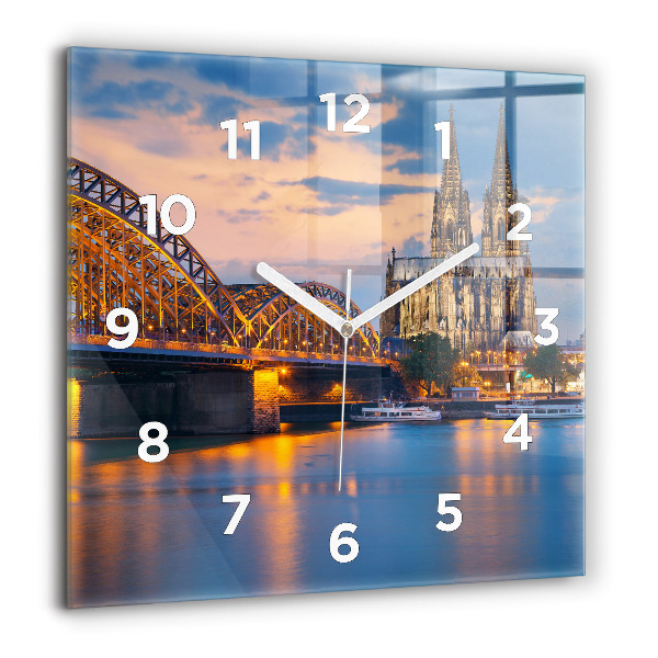 Square glass wall clock View of the town hall