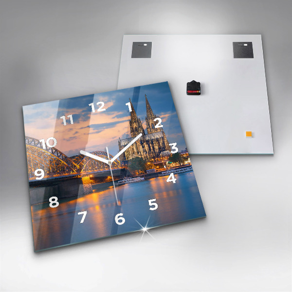 Square glass wall clock View of the town hall