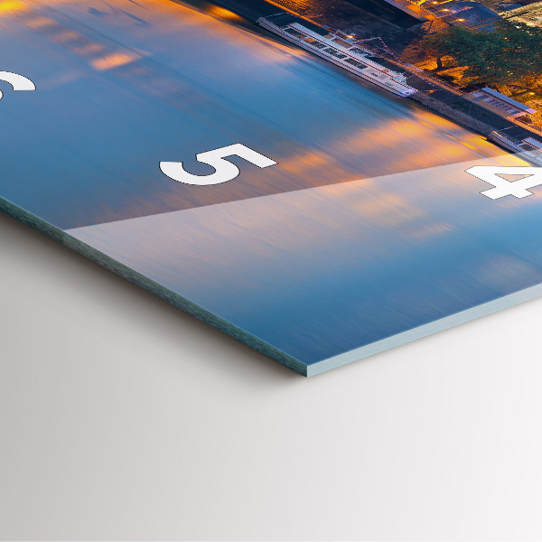 Square glass wall clock View of the town hall