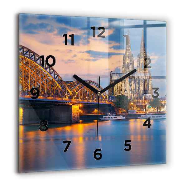 Square glass wall clock View of the town hall