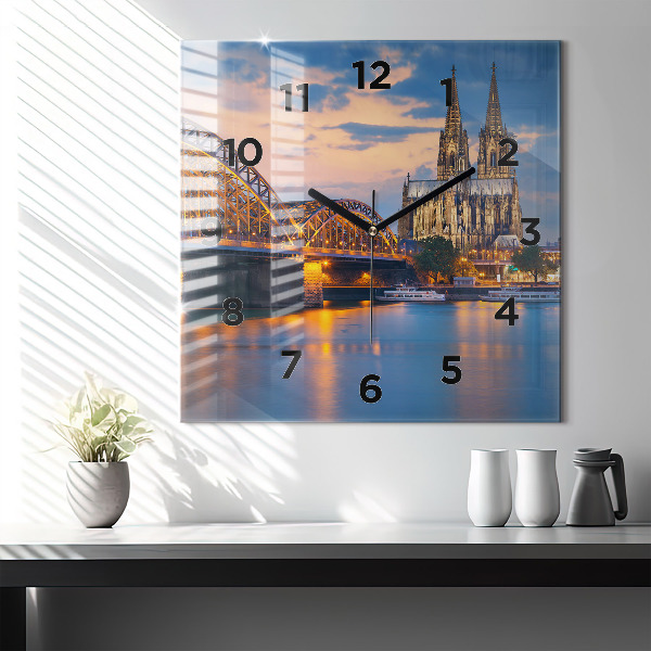 Square glass wall clock View of the town hall