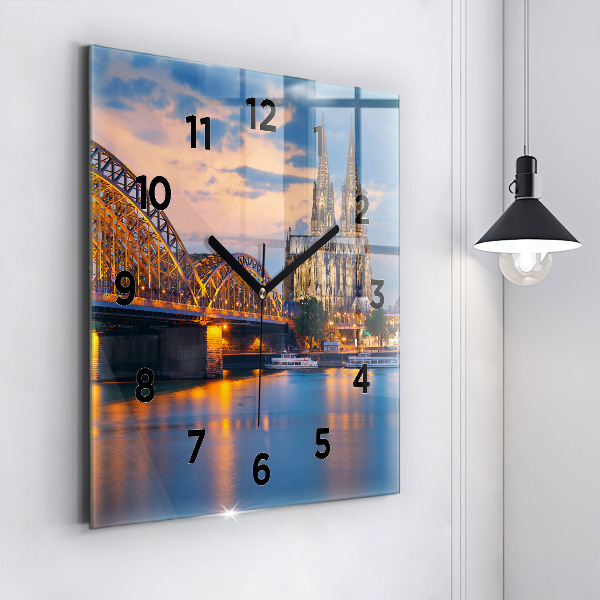Square glass wall clock View of the town hall