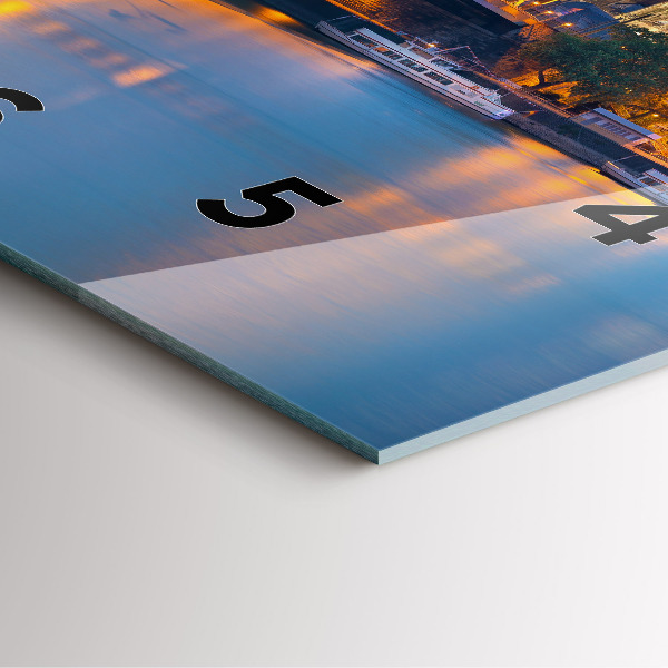 Square glass wall clock View of the town hall