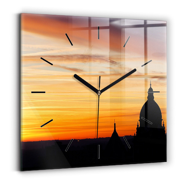 Square glass wall clock Building and sunset