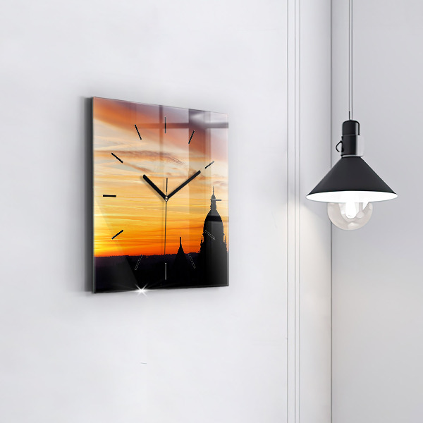 Square glass wall clock Building and sunset