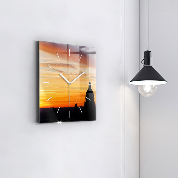 Square glass wall clock Building and sunset