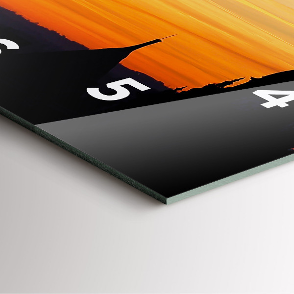 Square glass wall clock Building and sunset