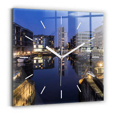 Square glass wall clock The city lit up at night