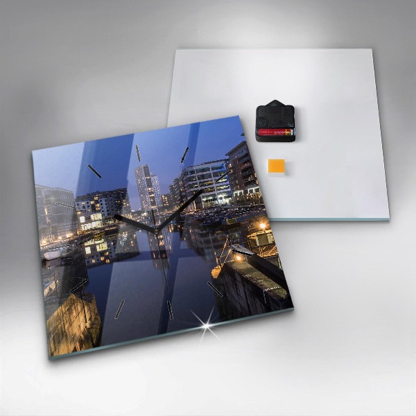 Square glass wall clock The city lit up at night