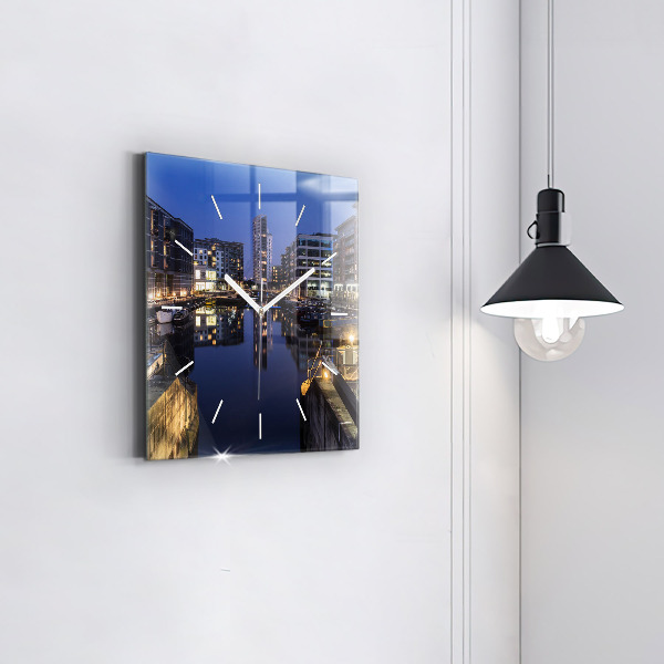 Square glass wall clock The city lit up at night