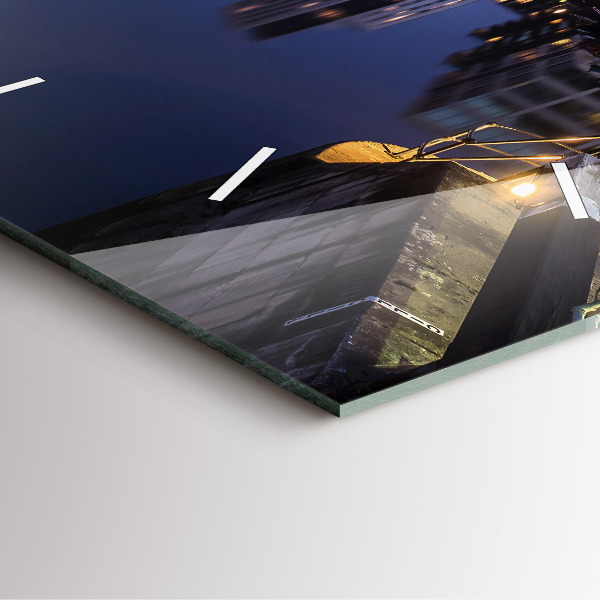 Square glass wall clock The city lit up at night