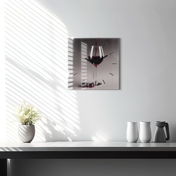 Square glass wall clock A glass of red wine