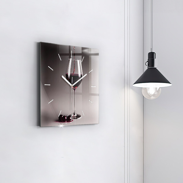 Square glass wall clock A glass of red wine