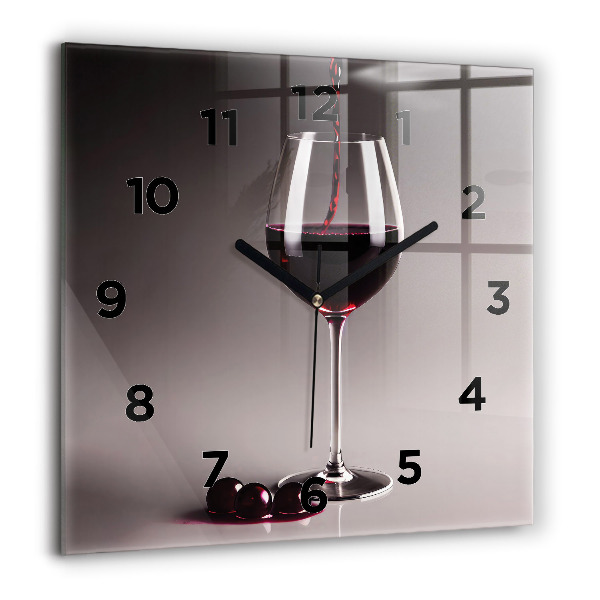 Square glass wall clock A glass of red wine