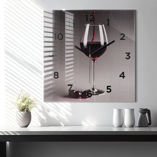 Square glass wall clock A glass of red wine