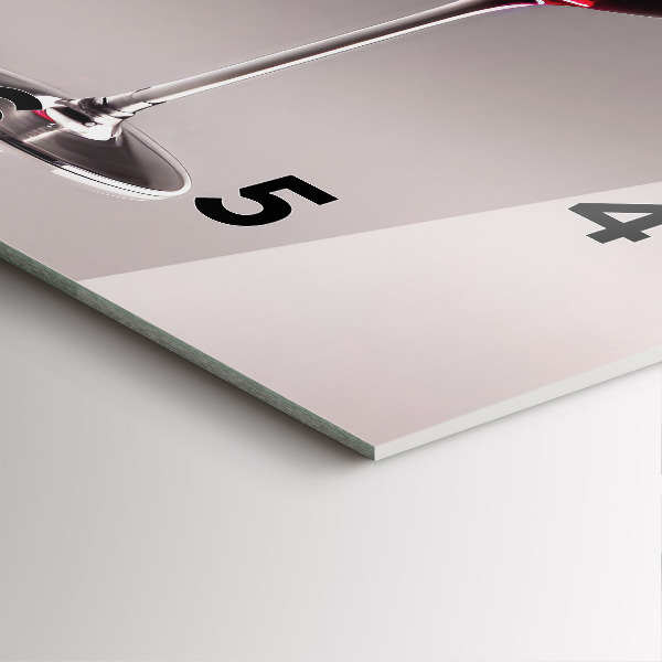 Square glass wall clock A glass of red wine