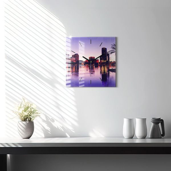 Square glass wall clock Evening panorama of the city