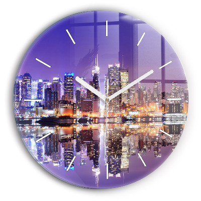 Round glass clock New York City at Night
