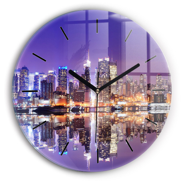 Round glass clock New York City at Night