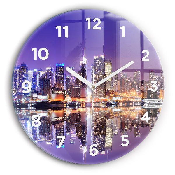 Round glass clock New York City at Night