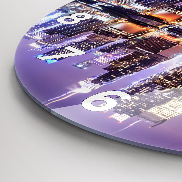 Round glass clock New York City at Night