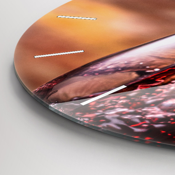 Round glass clock A glass of red wine