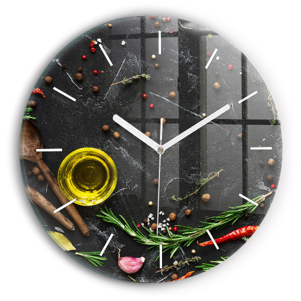 Round glass clock Spices on the counter