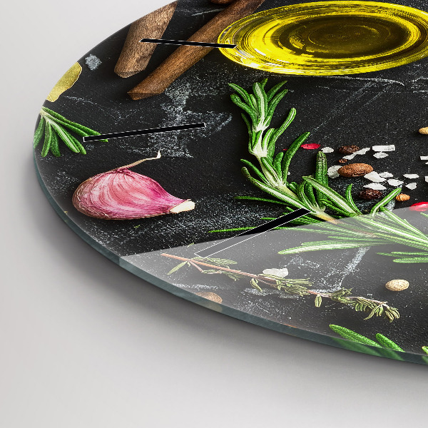 Round glass clock Spices on the counter