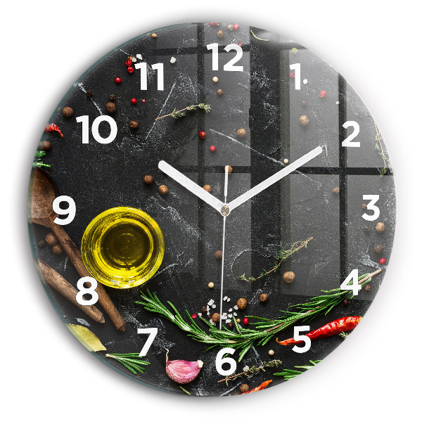 Round glass clock Spices on the counter