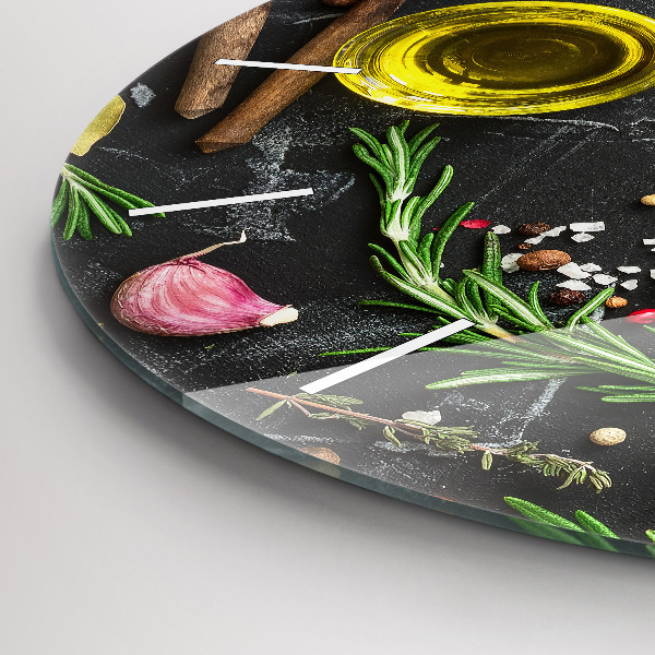 Round glass clock Spices on the counter