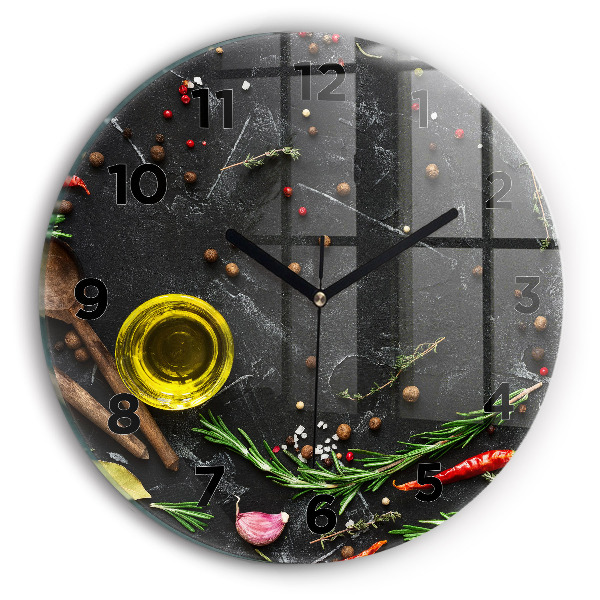 Round glass clock Spices on the counter