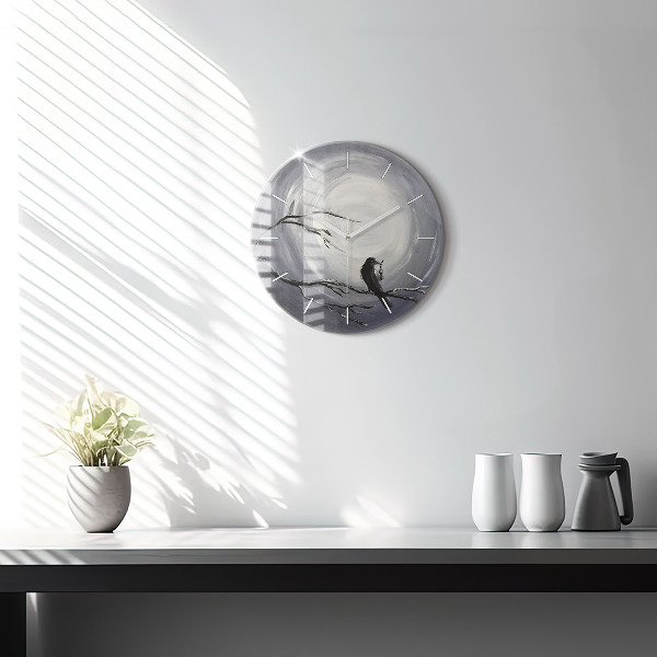 Round glass clock Raven in the moonlight
