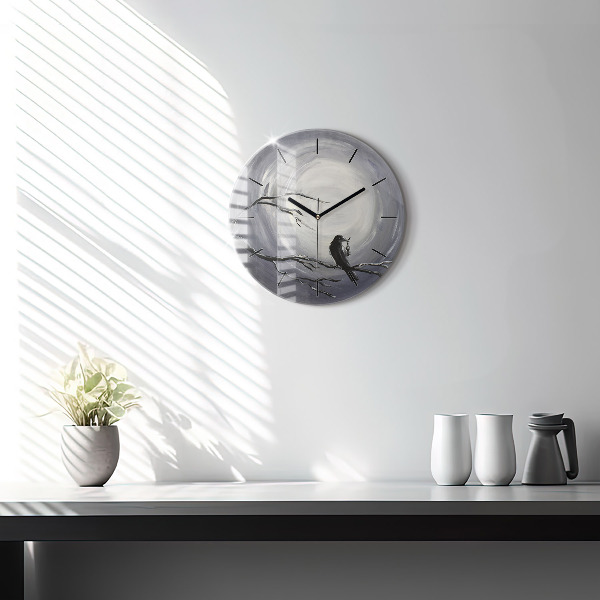 Round glass clock Raven in the moonlight