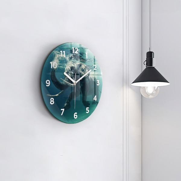 Round glass clock Swimming elephant in the ocean