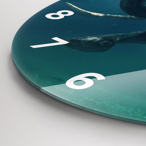 Round glass clock Swimming elephant in the ocean