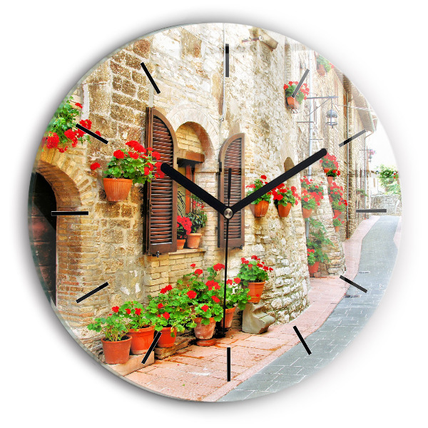 Round glass clock A picturesque street