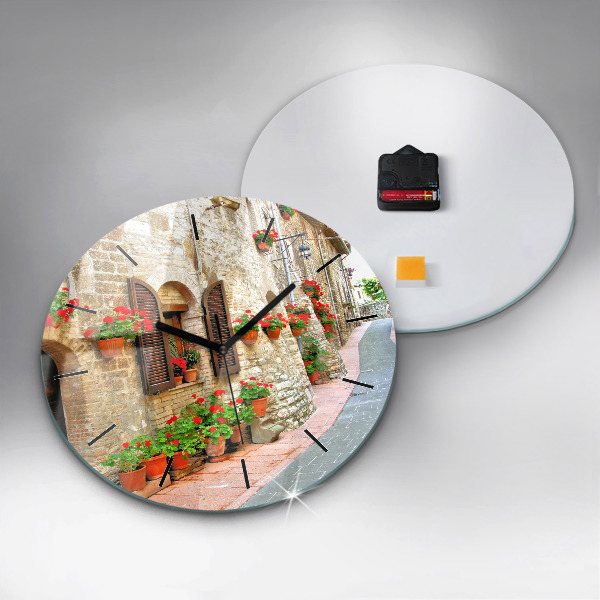 Round glass clock A picturesque street